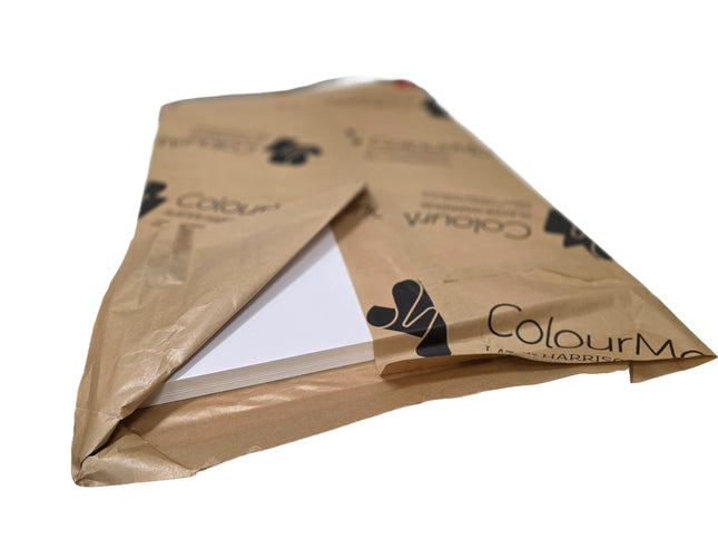 Brown envelope with white paper inside, branded 'Colour M'.