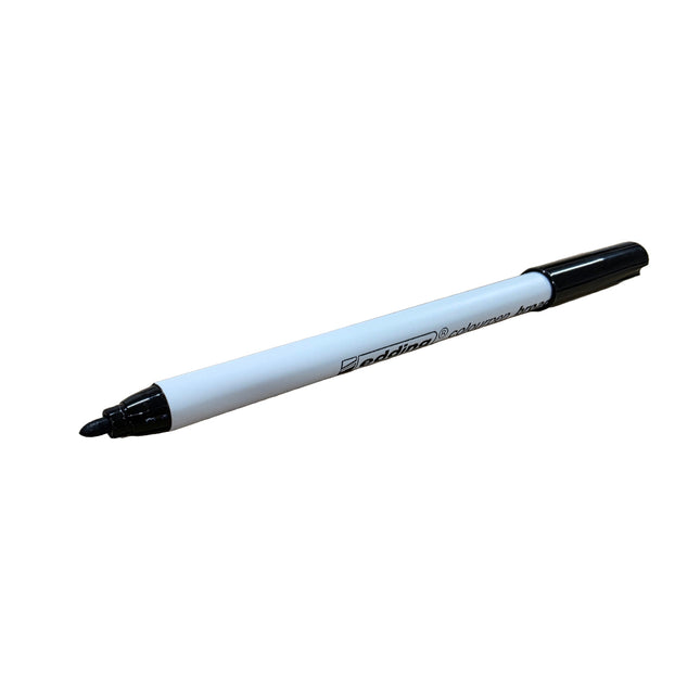 White pen with black cap on a white background