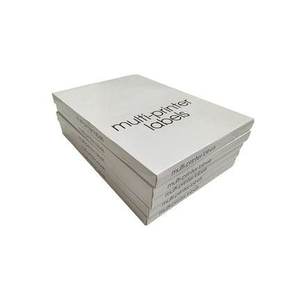 Stack of white label sheets with 'multi-prINTER labels' text on a white background