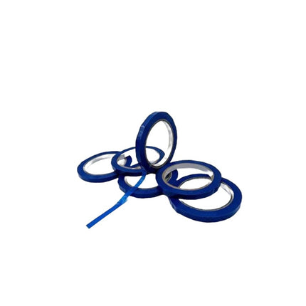 Blue tape with a white core on a white background