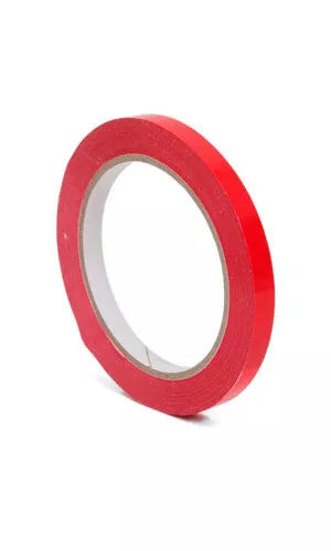 Red tape roll on a white background