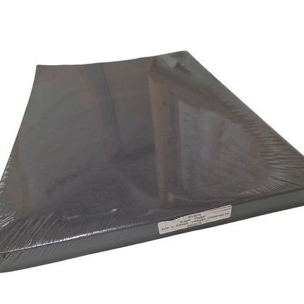 Black plastic sheet with a label on a white background