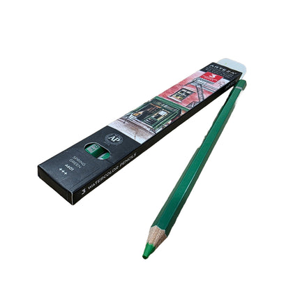 Green colored pencil with packaging on a white background