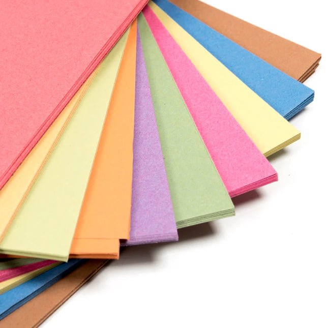 Stack of colorful paper sheets on a white background
