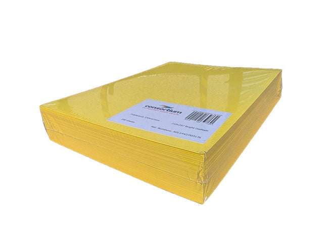 Stack of yellow sheets with a label on a white background
